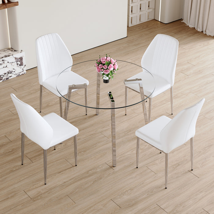 Table and chair set.Modern circular transparent tempered glass table, tempered glass tabletop, silver metal table legs.A Set of 4 White PU Comfort Dining Chairs with extended backrest.
